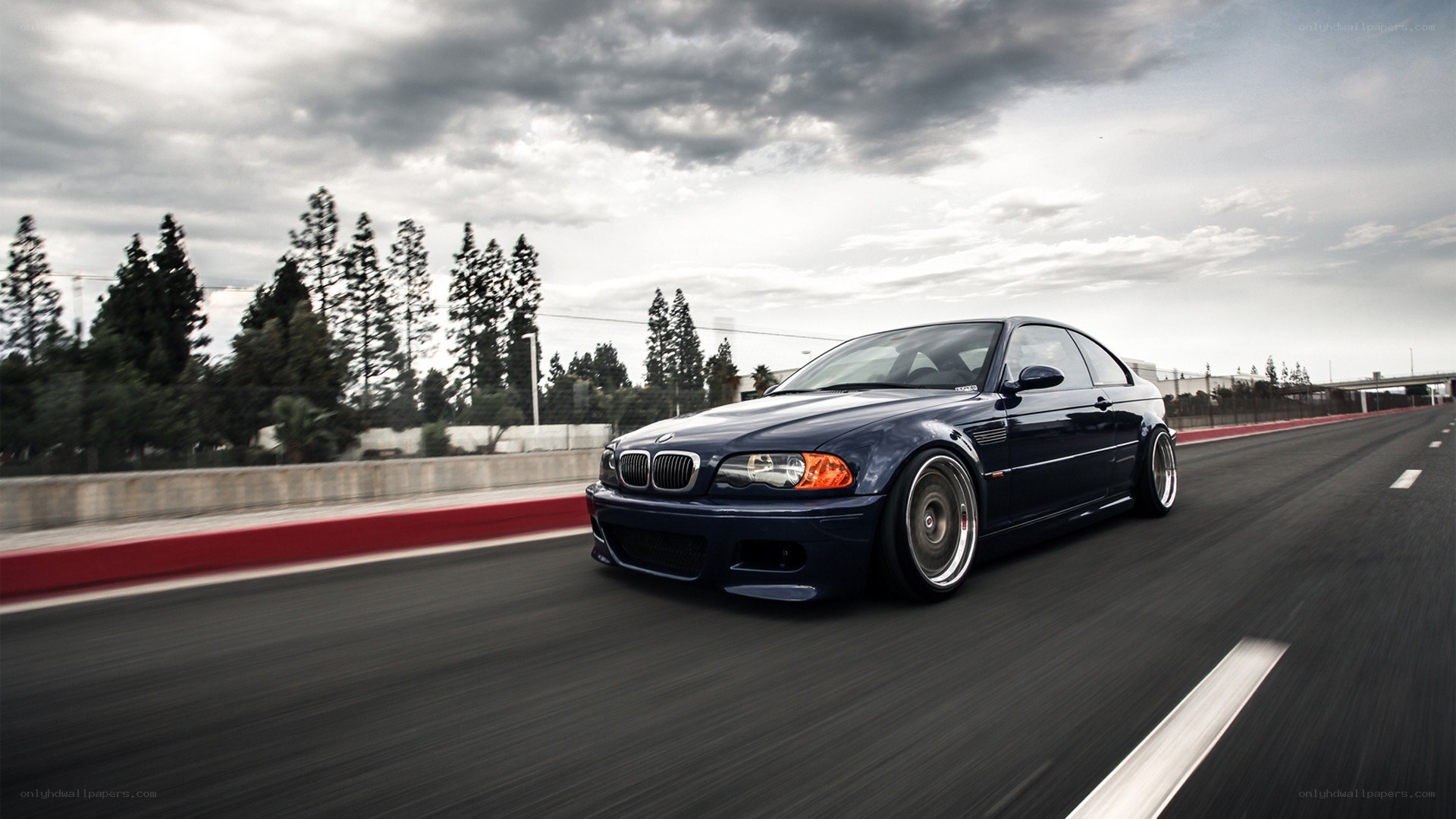 blue bmw on racetrack