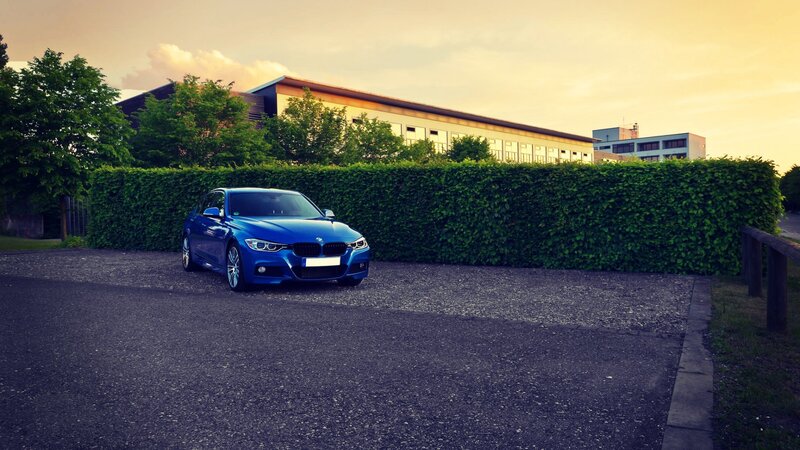 Blue BMW Sedan — Calm