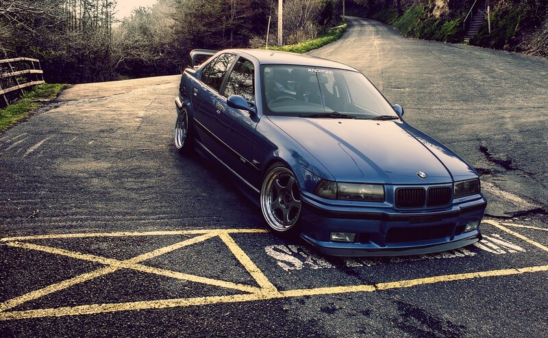 Blue BMW Sedan — Dramatic, Afternoon, Photograph
