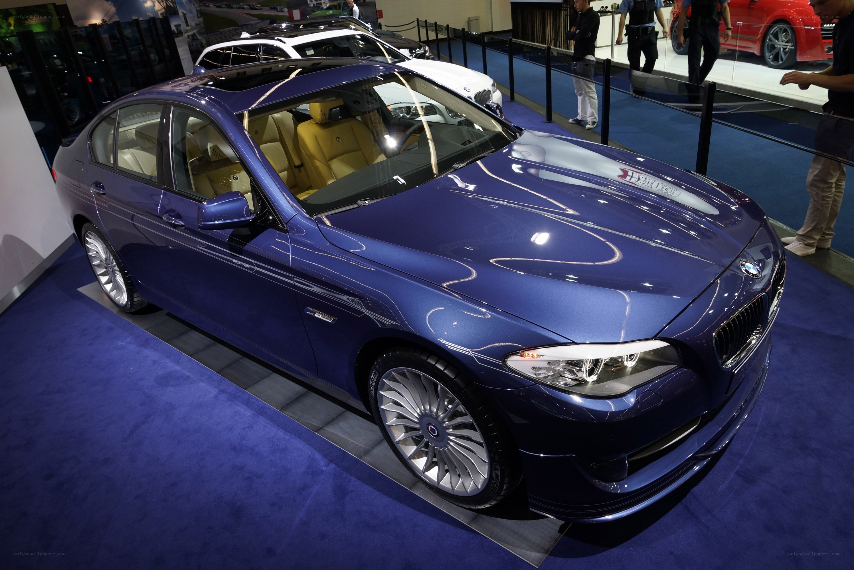 Blue BMW sedan on display