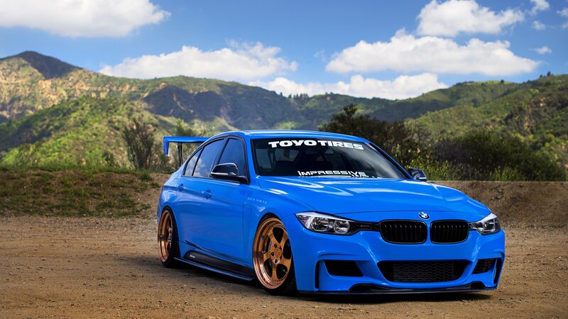 Blue BMW Sedan — Outdoor