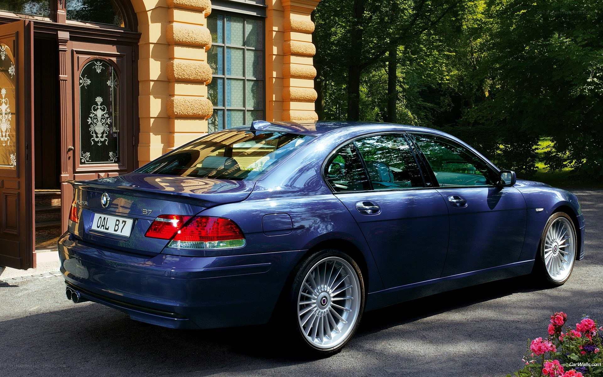 blue bmw sedan parked