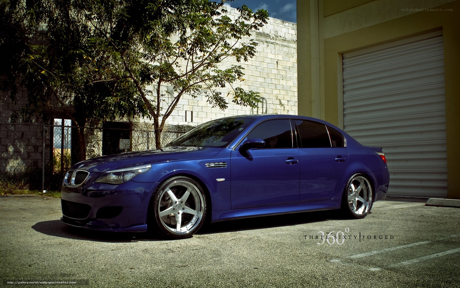 blue bmw sedan parked