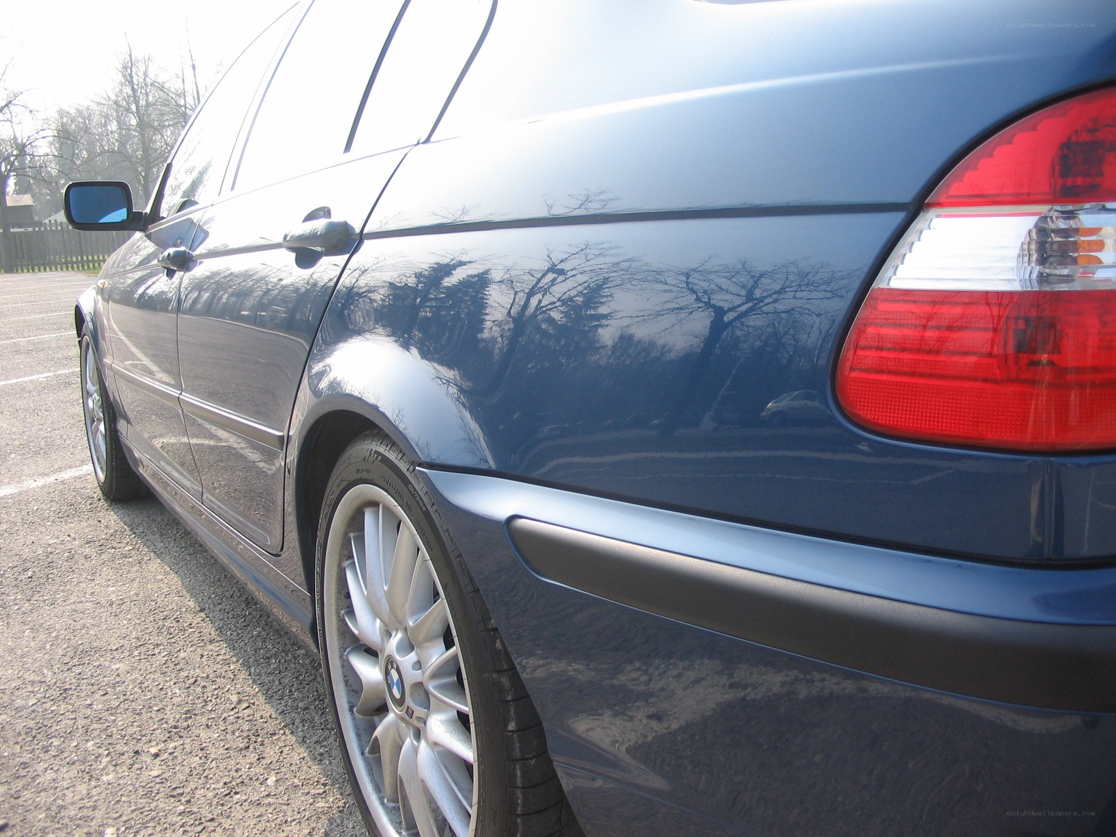 blue bmw sedan side view