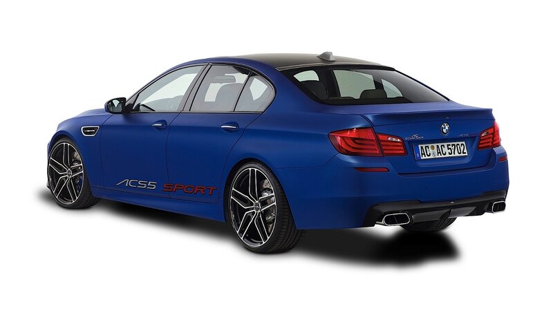 blue bmw sedan with sport decals