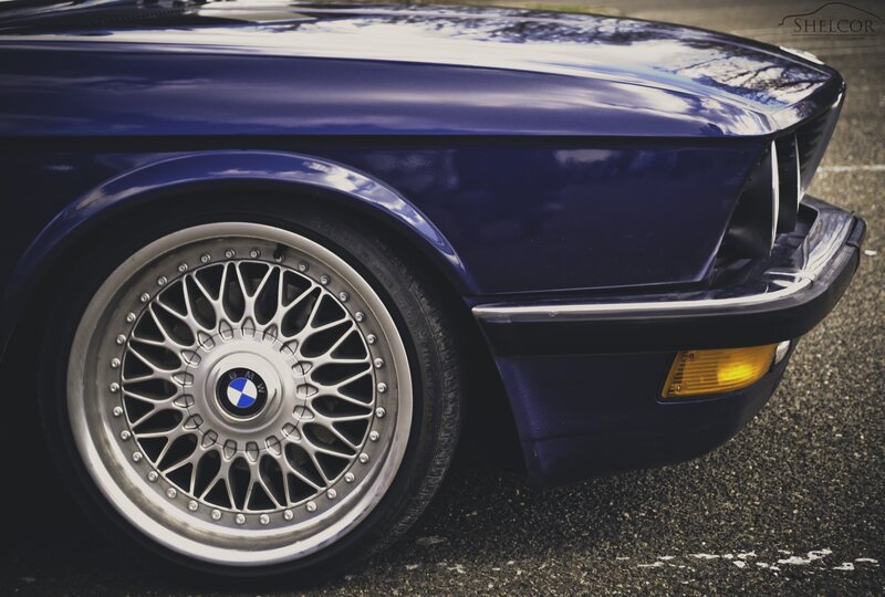 blue bmw with alloy wheels