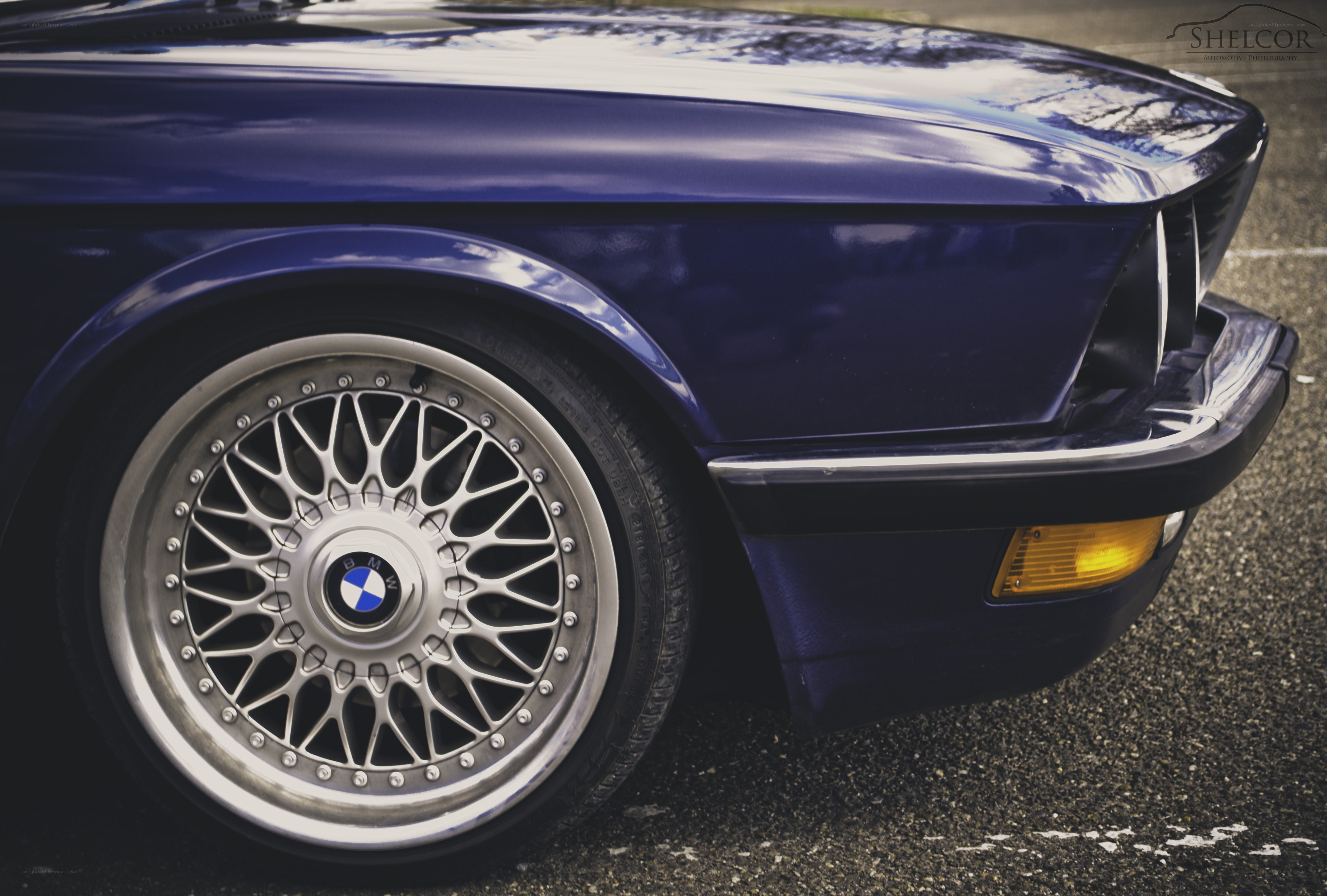 blue bmw with alloy wheels