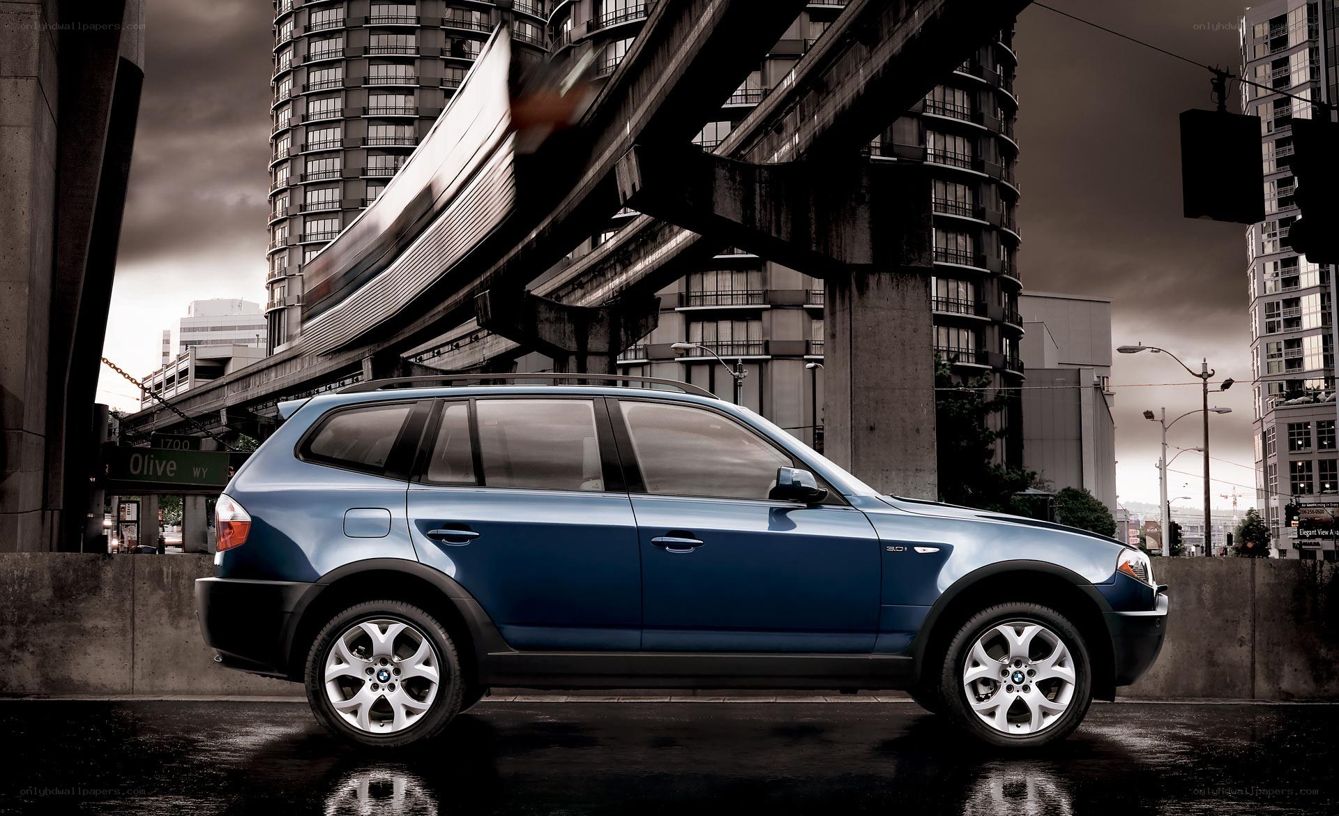 Blue BMW X3 in urban setting