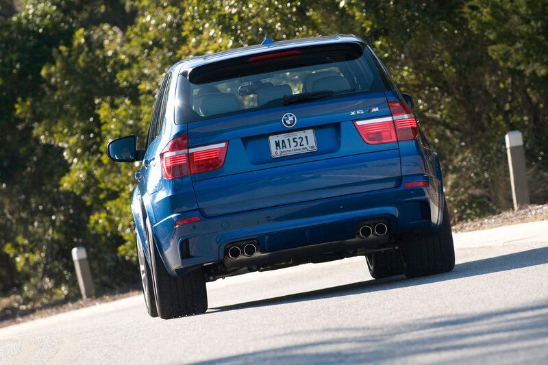 blue bmw x5 m on road