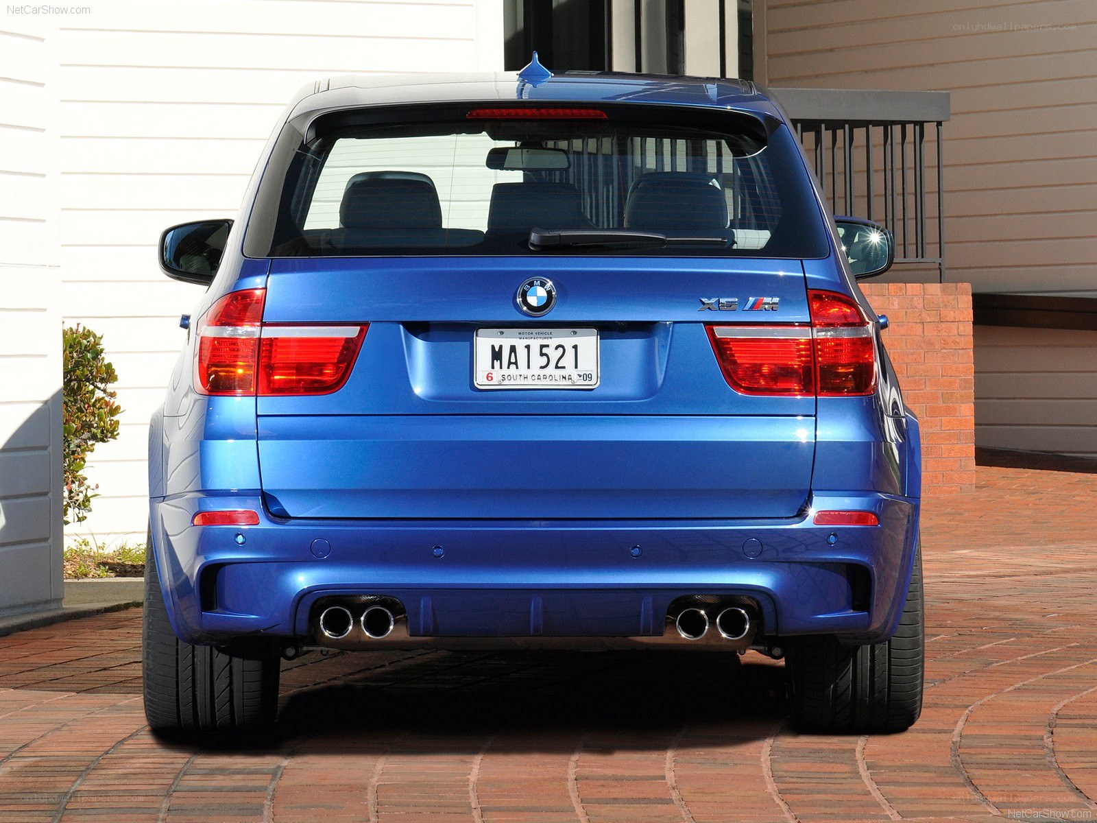 Blue BMW X5 M rear view