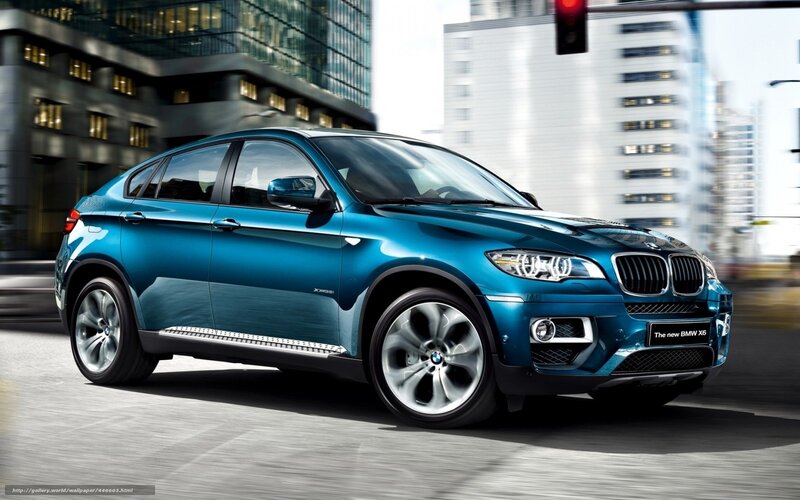 Blue BMW X6 in city