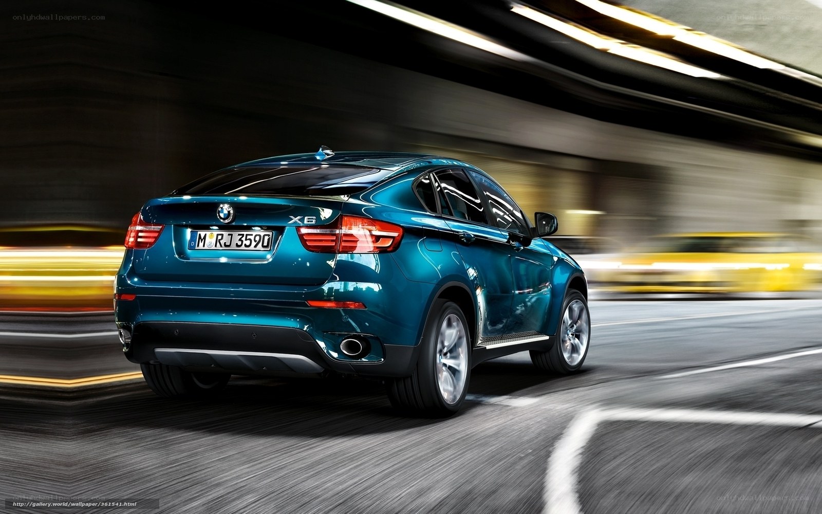 Blue BMW X6 in motion