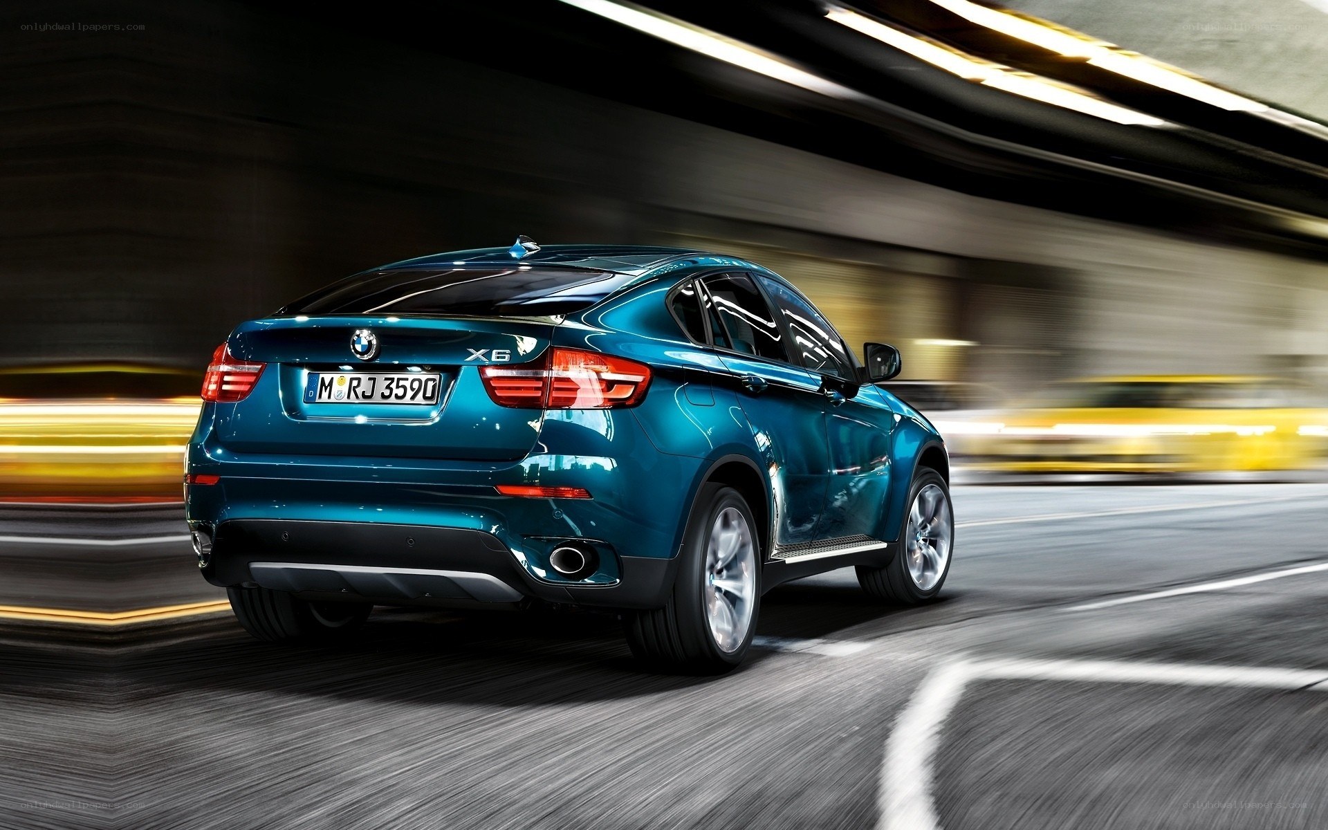Blue BMW X6 in motion