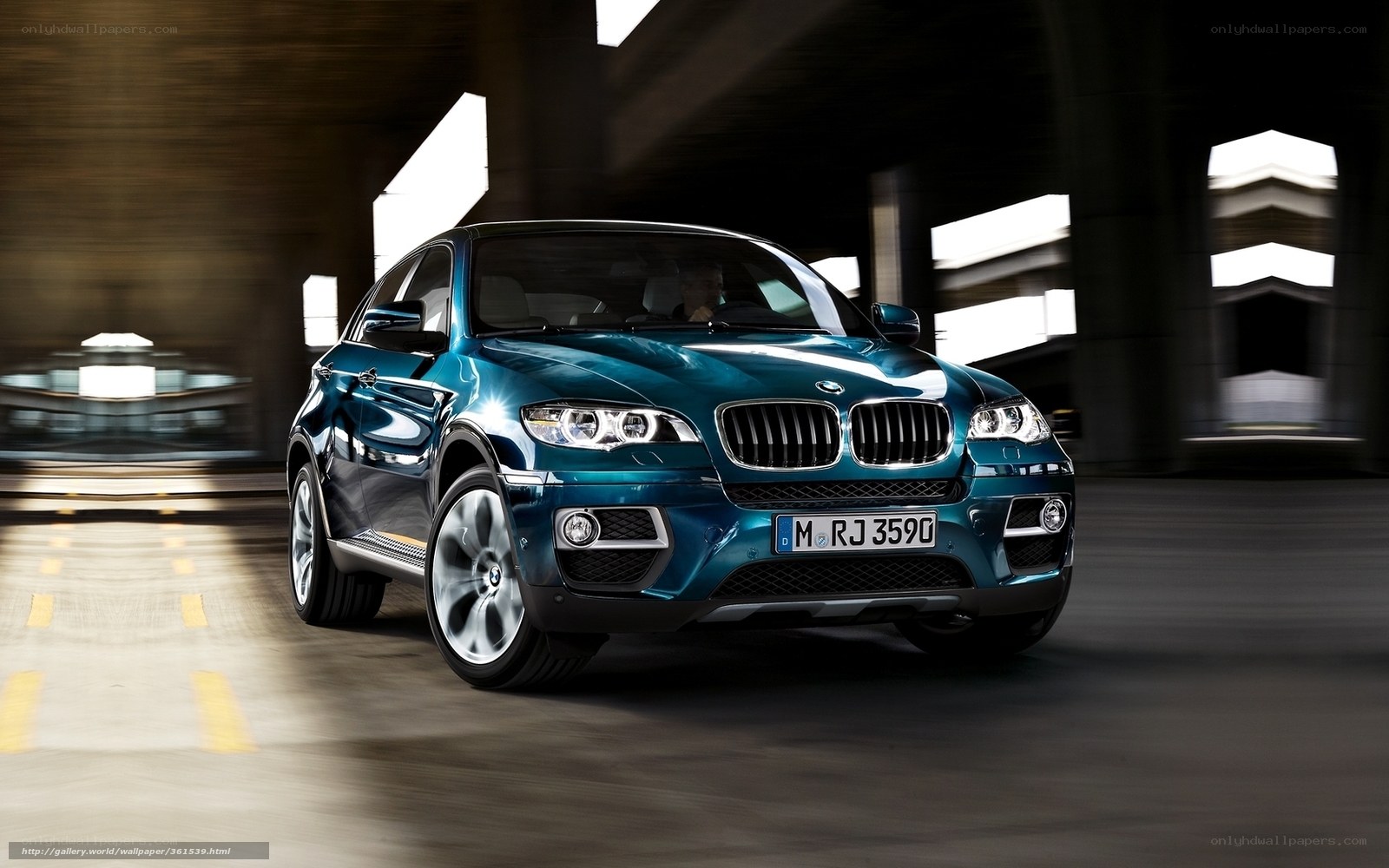 Blue BMW X6 in motion