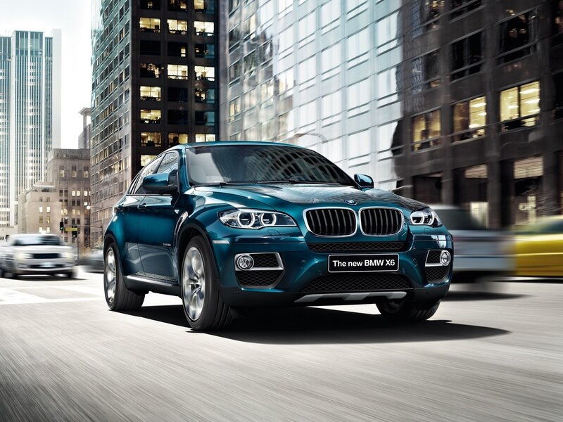 Blue BMW X6 SUV — Teal, Dynamic