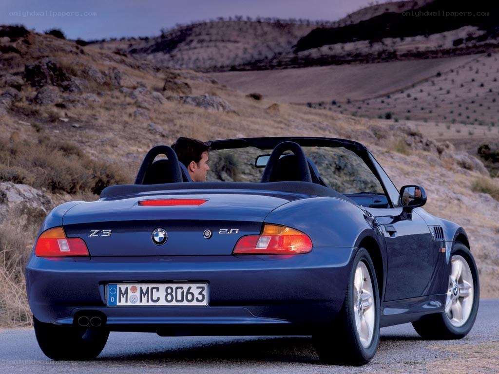 Blue BMW Z3 convertible on road