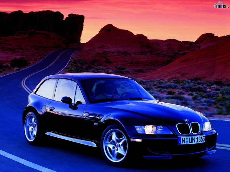 Blue BMW Z3 on desert road