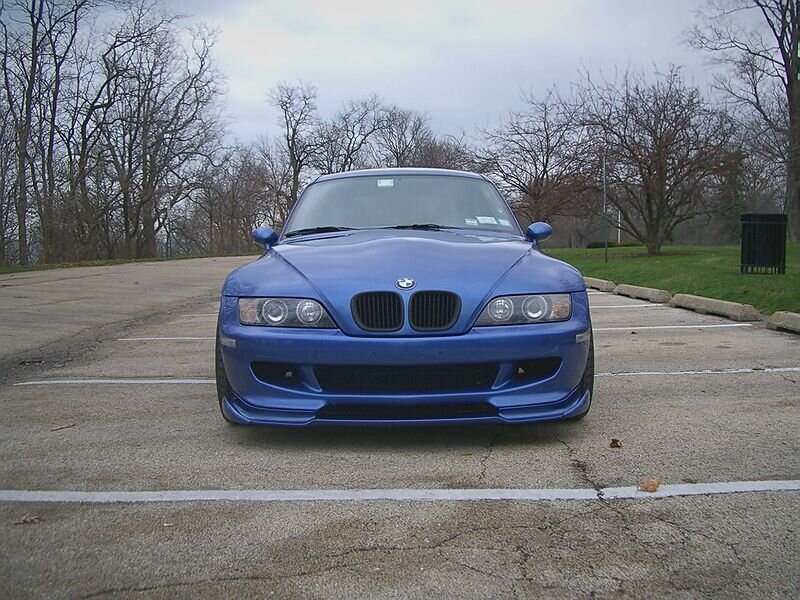 blue bmw z3 parked in lot