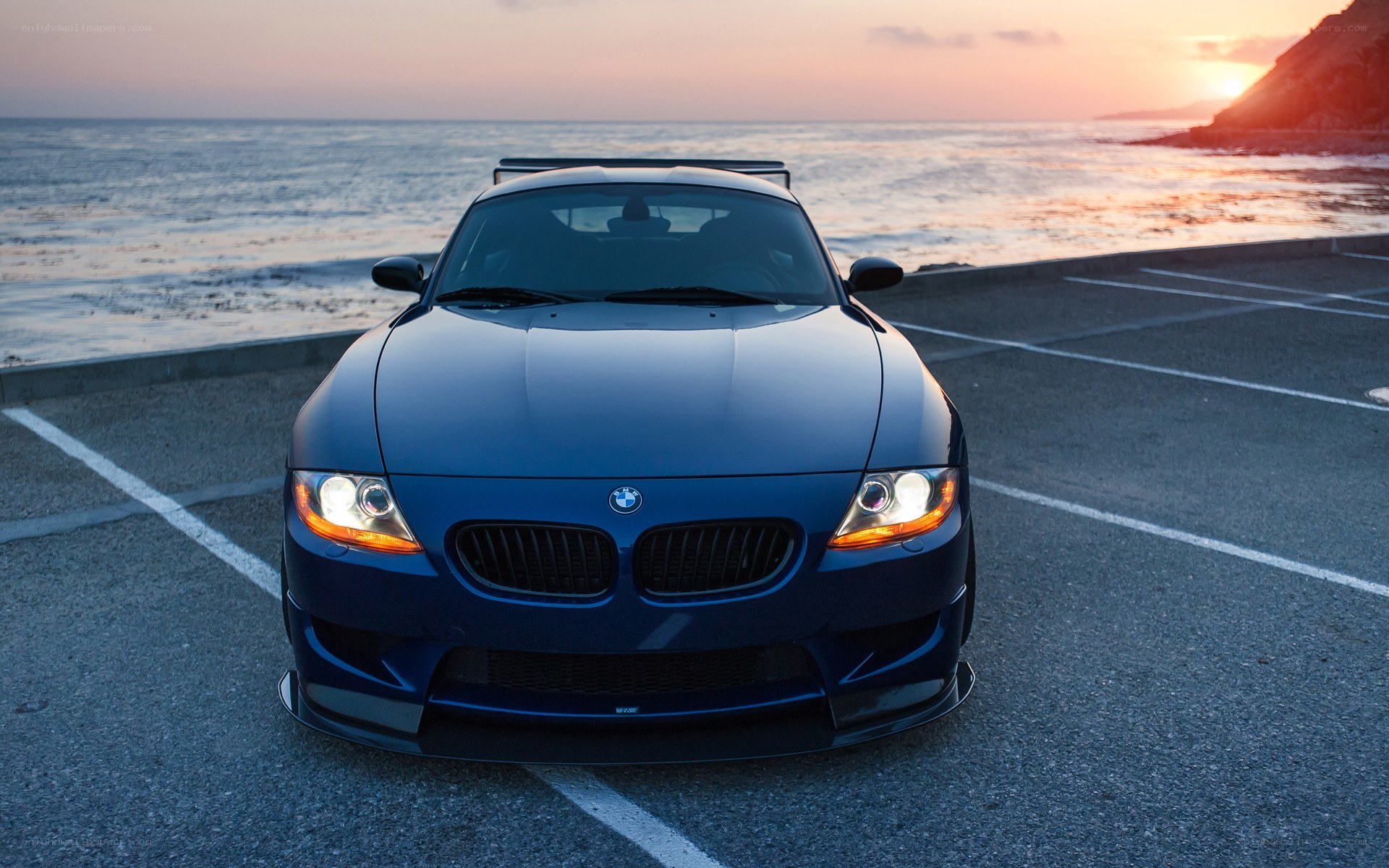Blue BMW Z4 at sunset