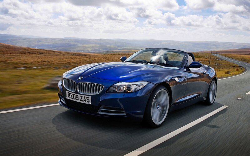 Blue BMW Z4 convertible on road