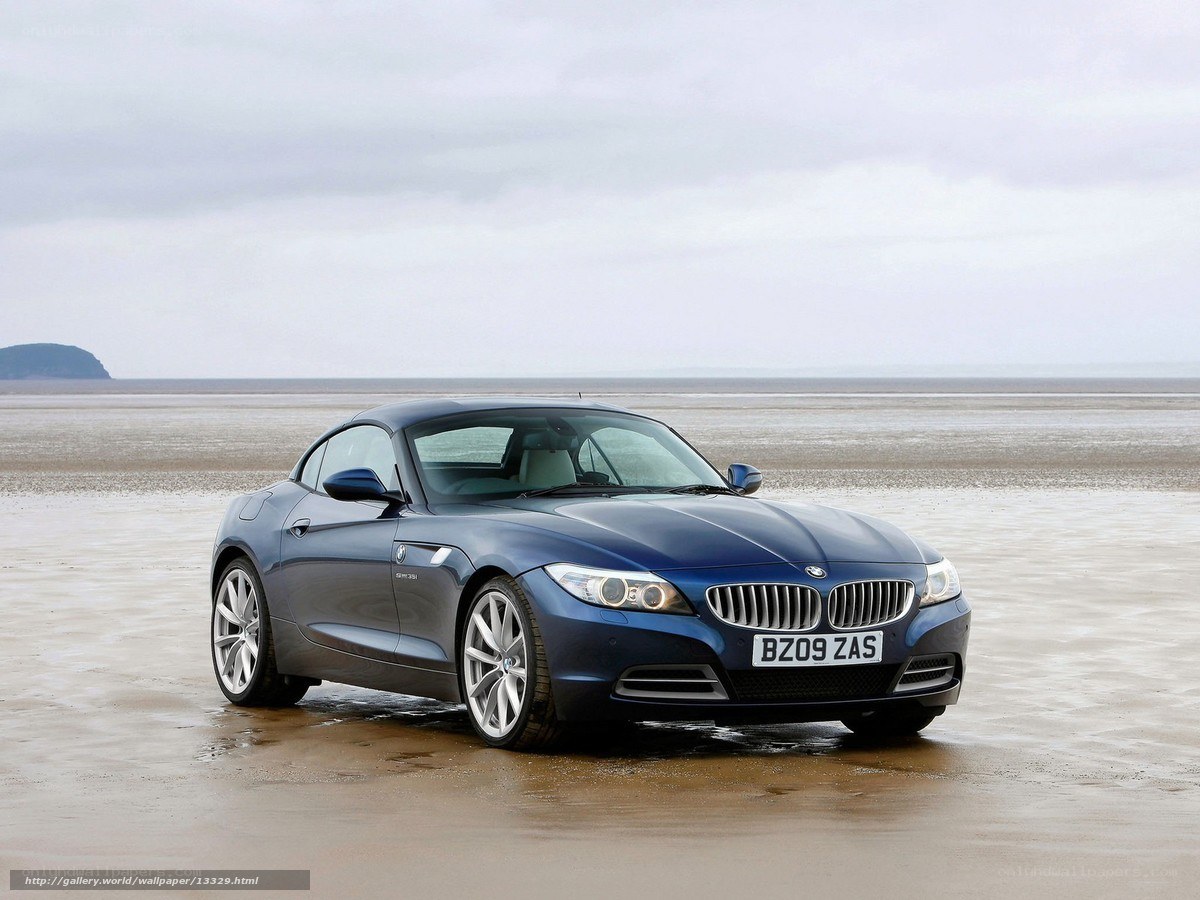 Blue BMW Z4 on a beach
