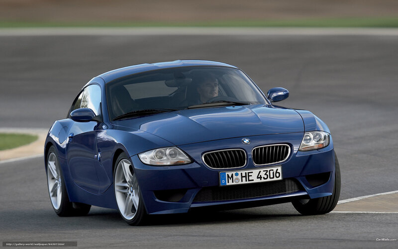 Blue BMW Z4 on a racetrack
