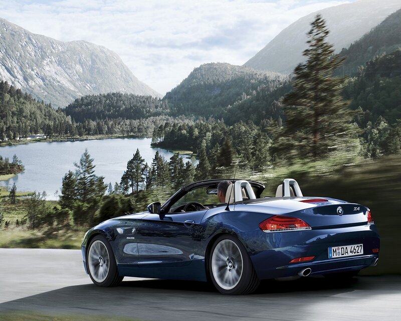 Blue BMW Z4 on a scenic road