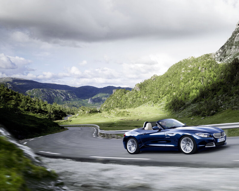 Blue BMW Z4 on a winding road
