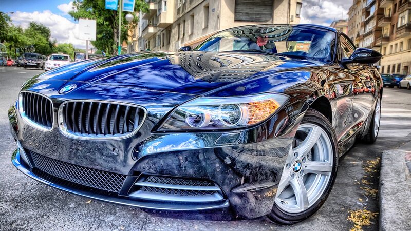 Blue BMW Z4 parked on street