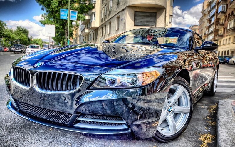 Blue BMW Z4 parked on street