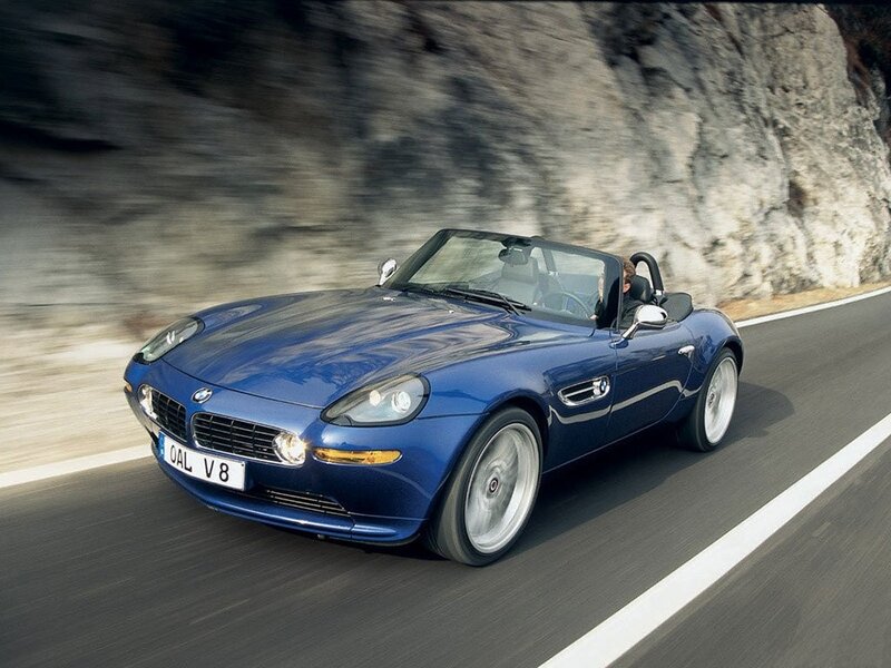 Blue BMW Z8 on a winding road