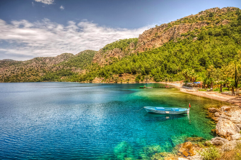 Blue Boat in Bay