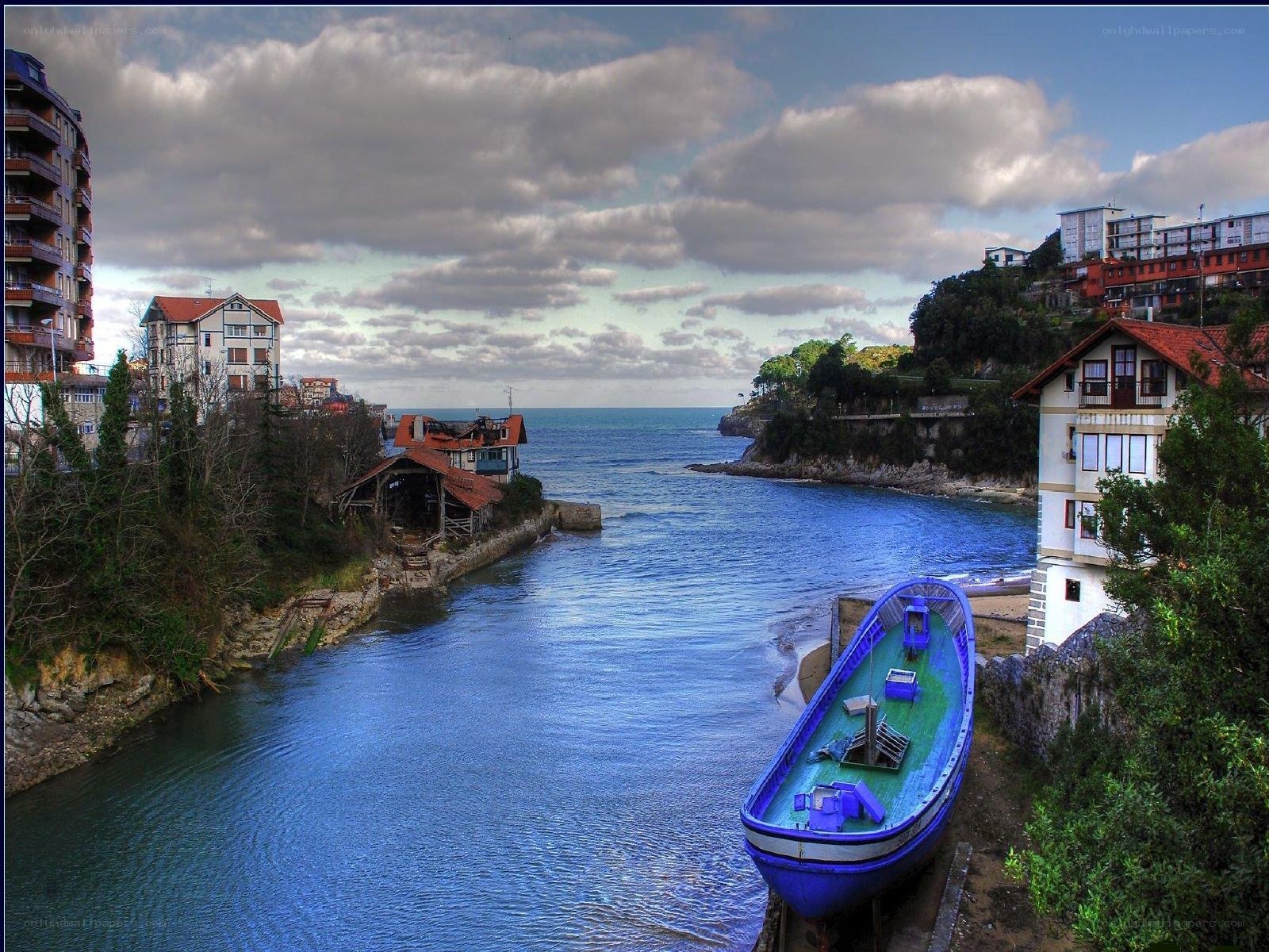 Blue boat in coastal town