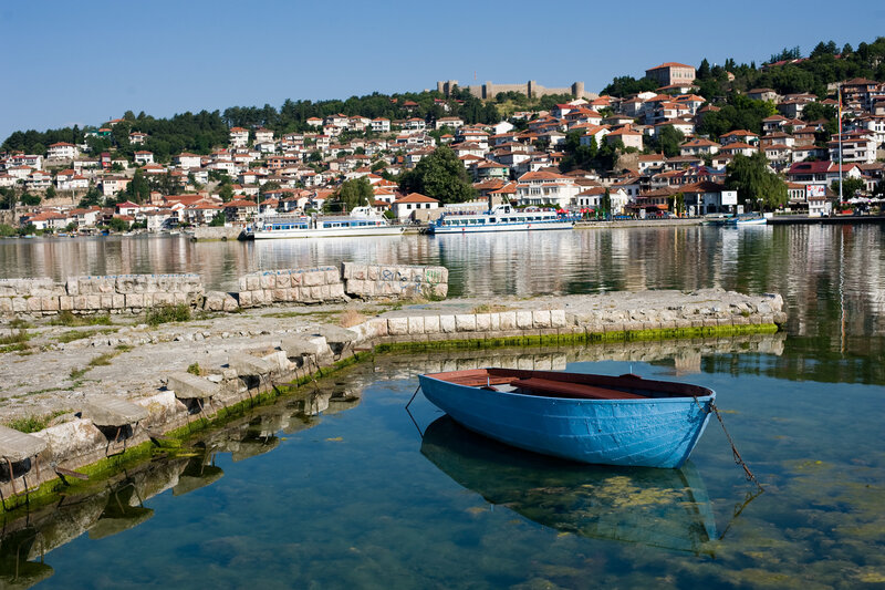 Blue Boat in Harbor