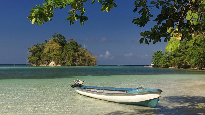 Blue Boat in Shallow Water