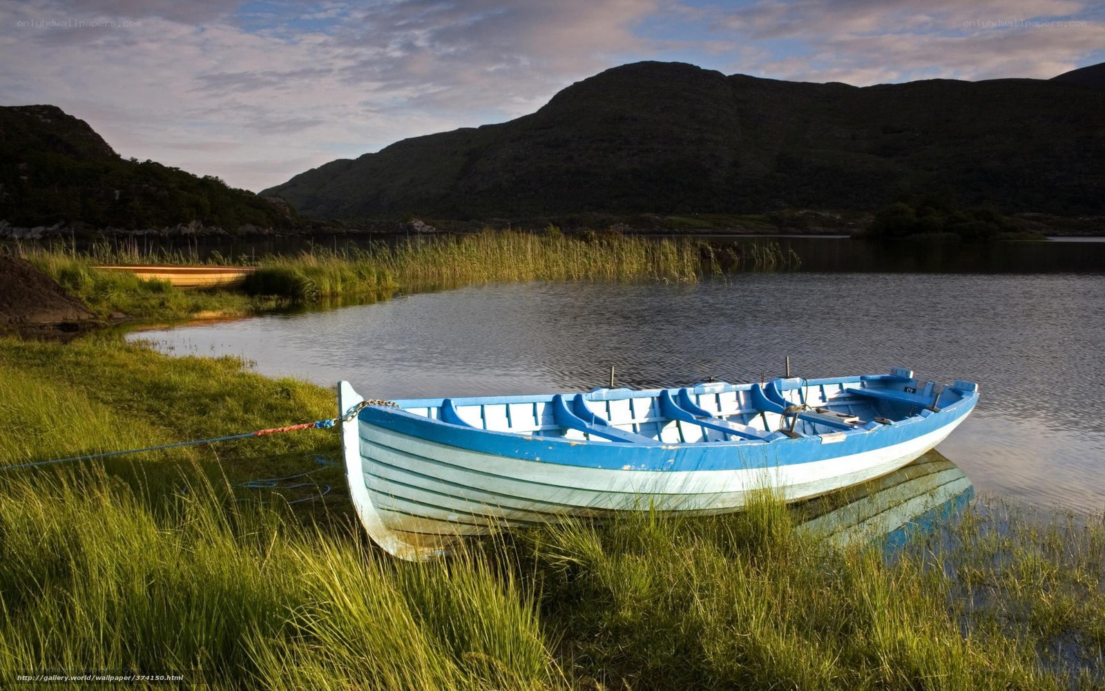 Blue boat on a lakeside