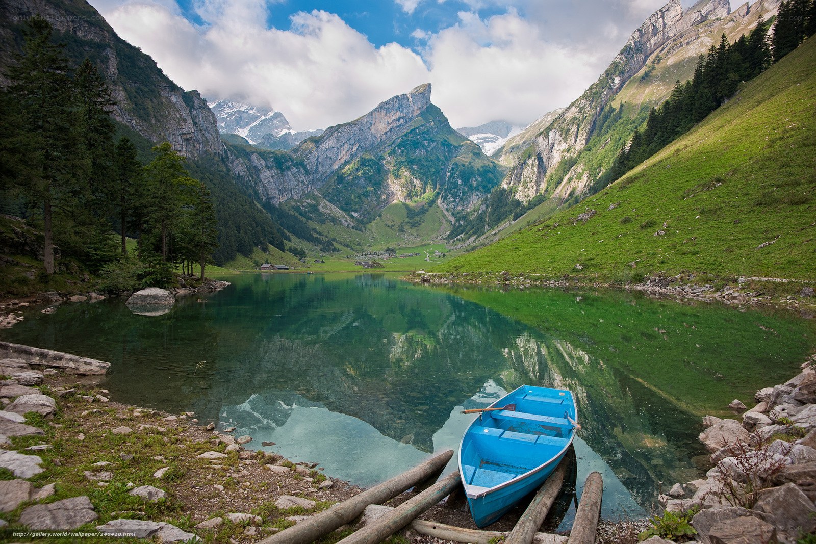Blue boat on a mountain lake