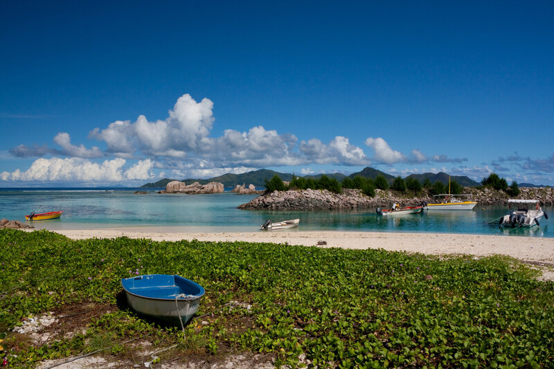 Blue Boat on Beach — Serene