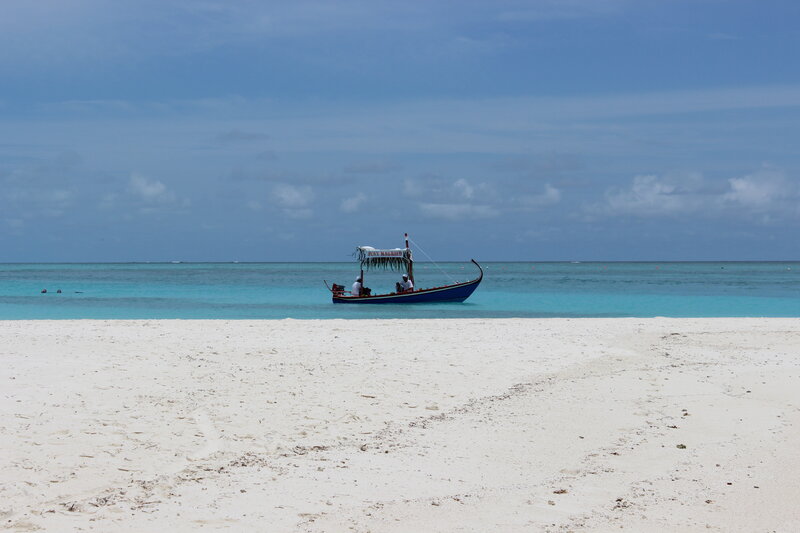 Blue Boat on Beach — White, Serene