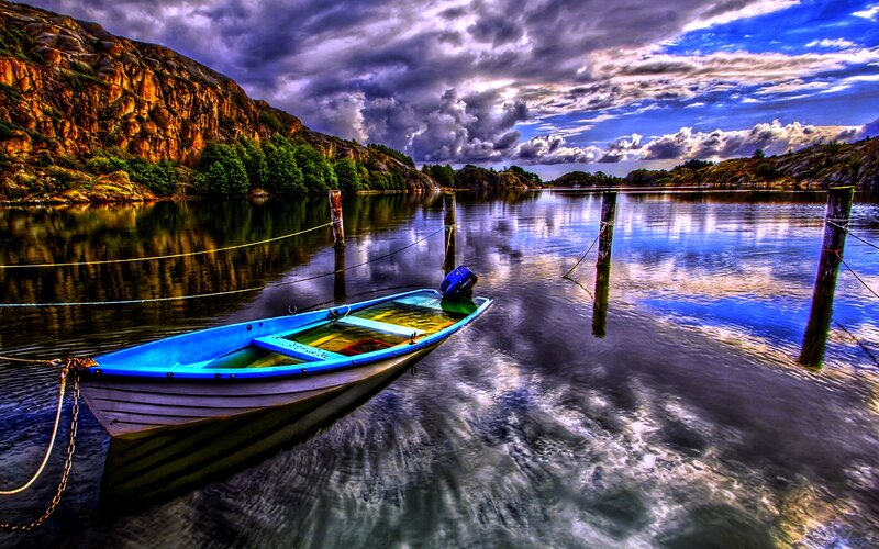 Blue Boat on Calm Water