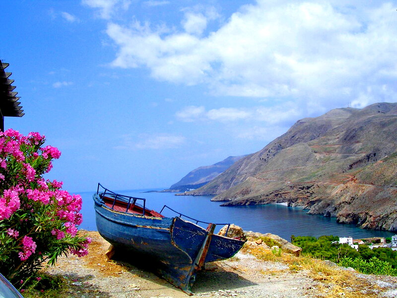 Blue Boat on Cliff