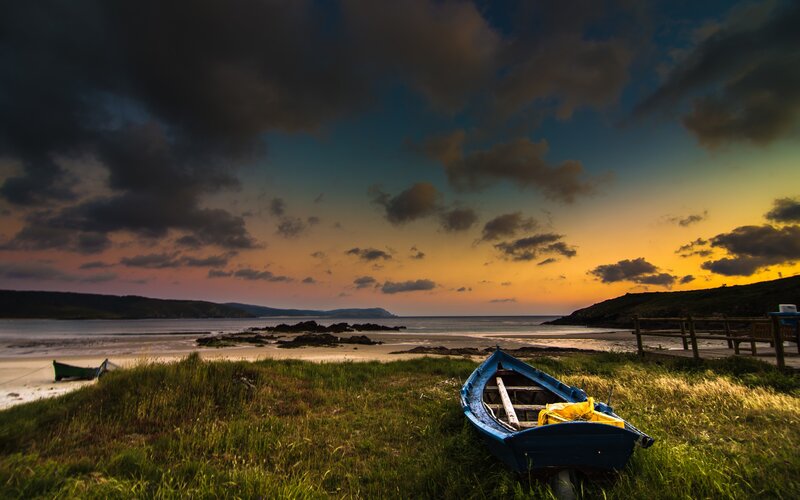 Blue Boat on Grass