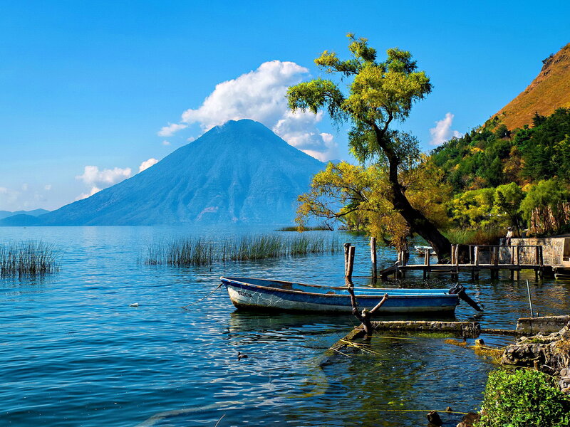Blue Boat on Lake — Serene, Afternoon, Photograph, Mountain