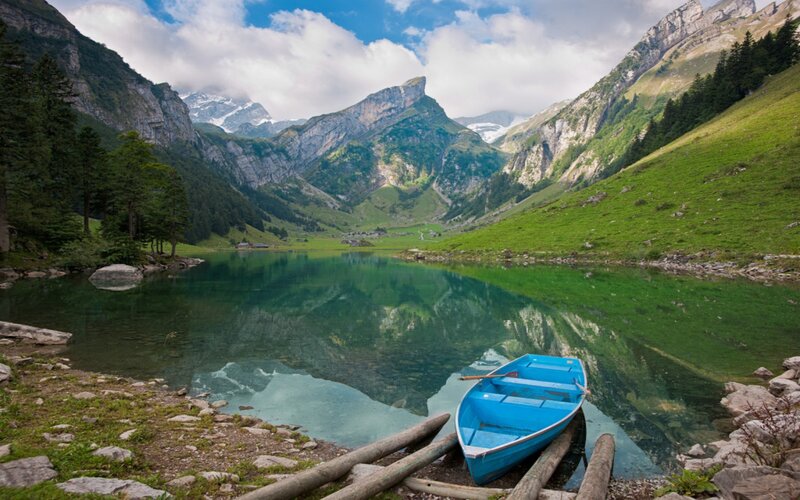 Blue Boat on Lake Shore