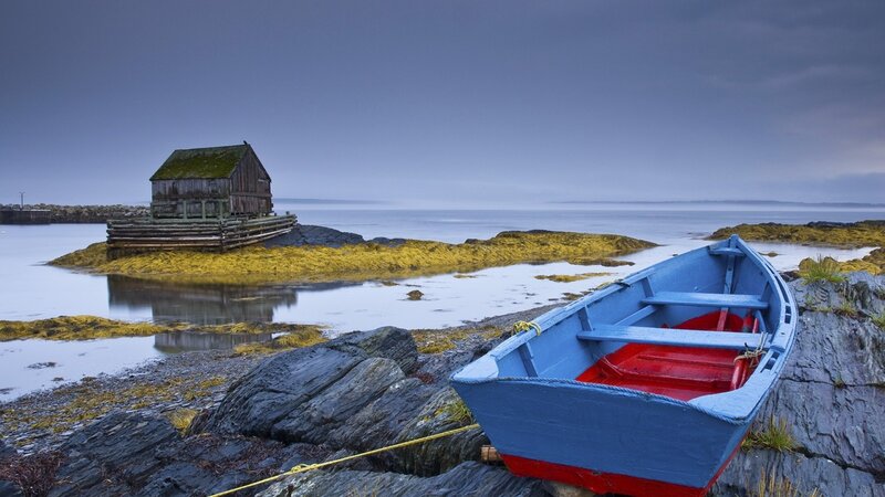 Blue Boat on Rocks — Serene