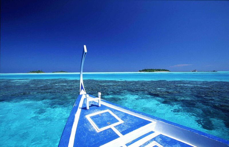 Blue Boat on Turquoise Water