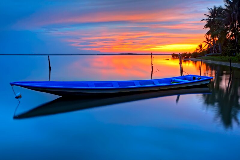 Blue Boat on Water — Serene, Sunset, Photograph