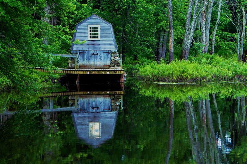 Blue Boathouse on Water — Green