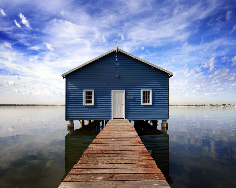 Blue Boathouse on Water — Serene, Afternoon, Photograph, Dock, Sky, Clouds