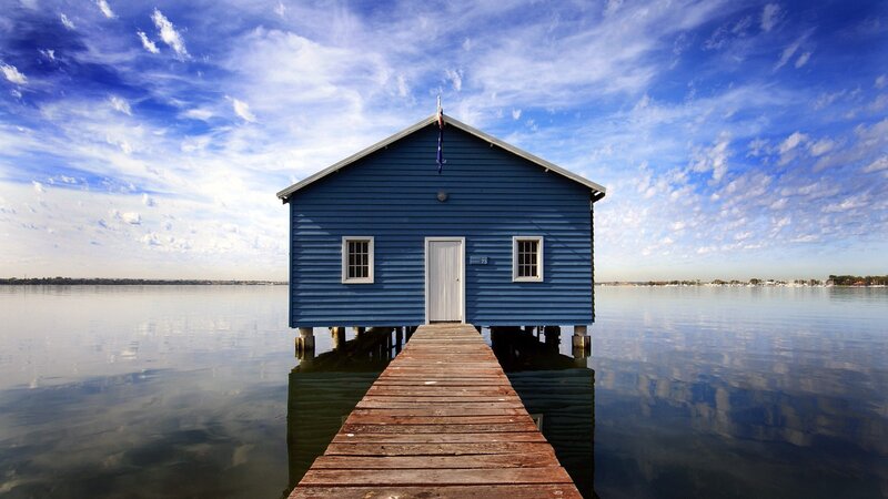 Blue Boathouse on Water — Serene, Afternoon, Photograph, Dock, Sky, Clouds, White, Brown